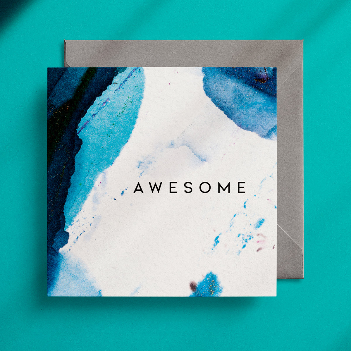 Blue and white ink design on a square greeting card with the word "Awesome" in the centre