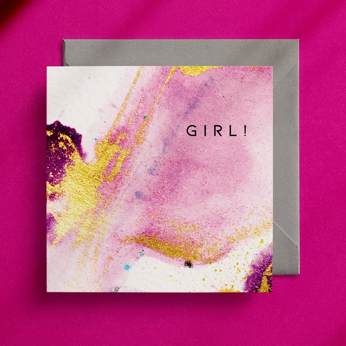 Feminine, pink and gold greeting card with an abstract design and the word "Girl!" in the top right corner