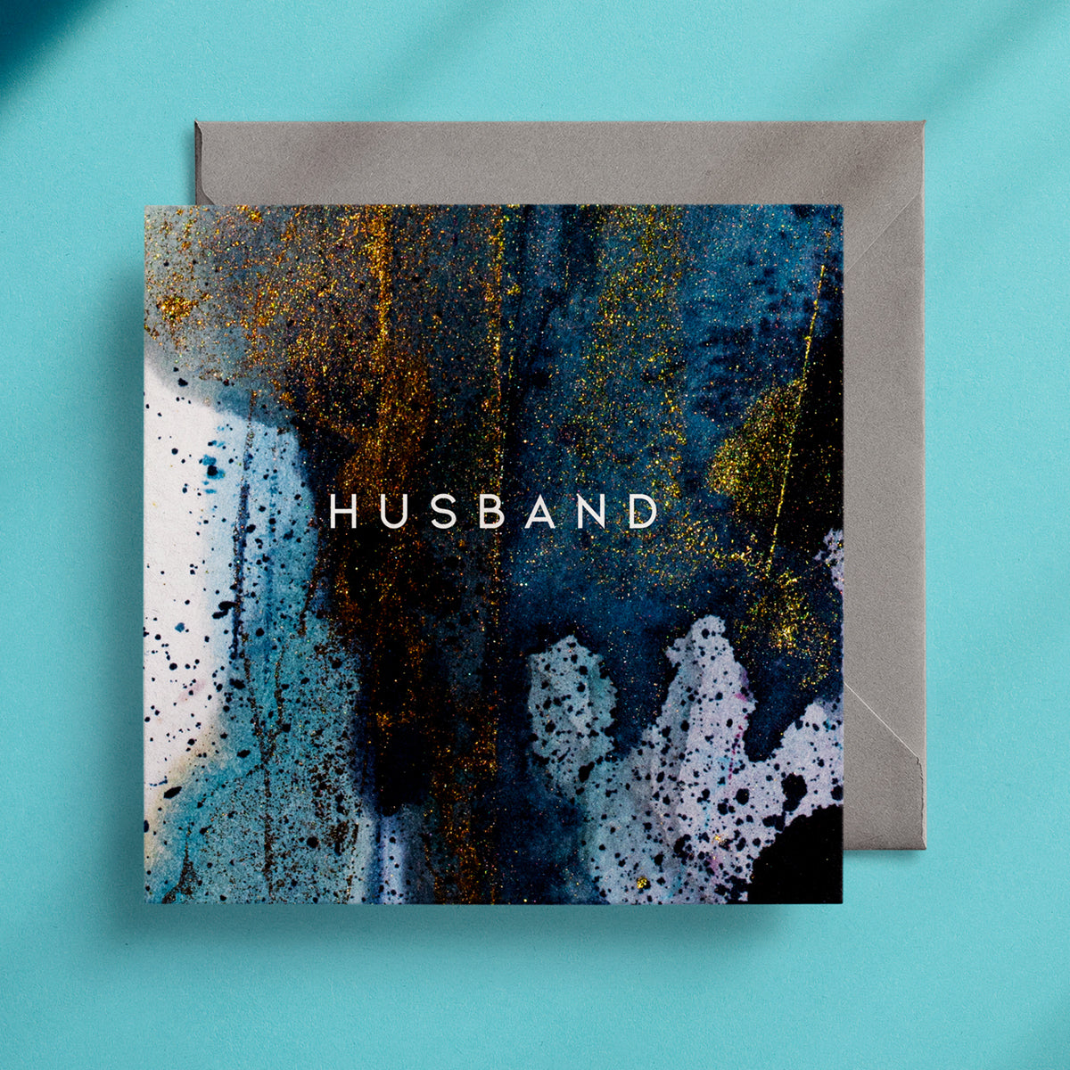 Dark blue and gold greeting card design with the caption "Husband" in the centre
