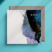 Navy blue and white greeting card design that says "Son" in the top right corner