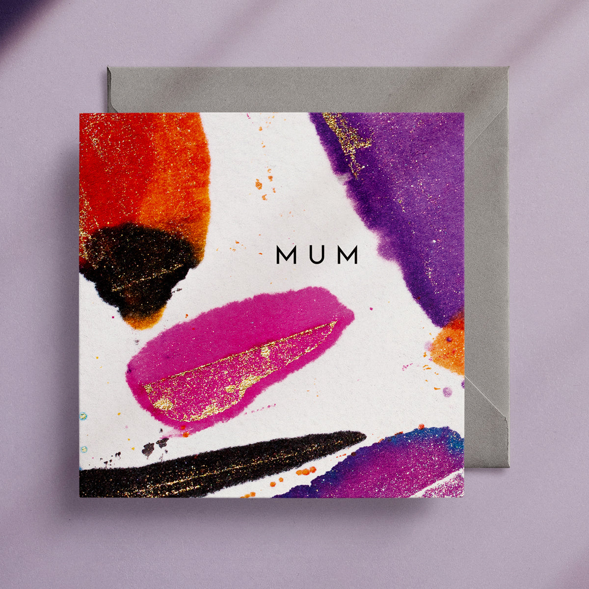 Brightly coloured greeting card that says the word "Mum" in the centre