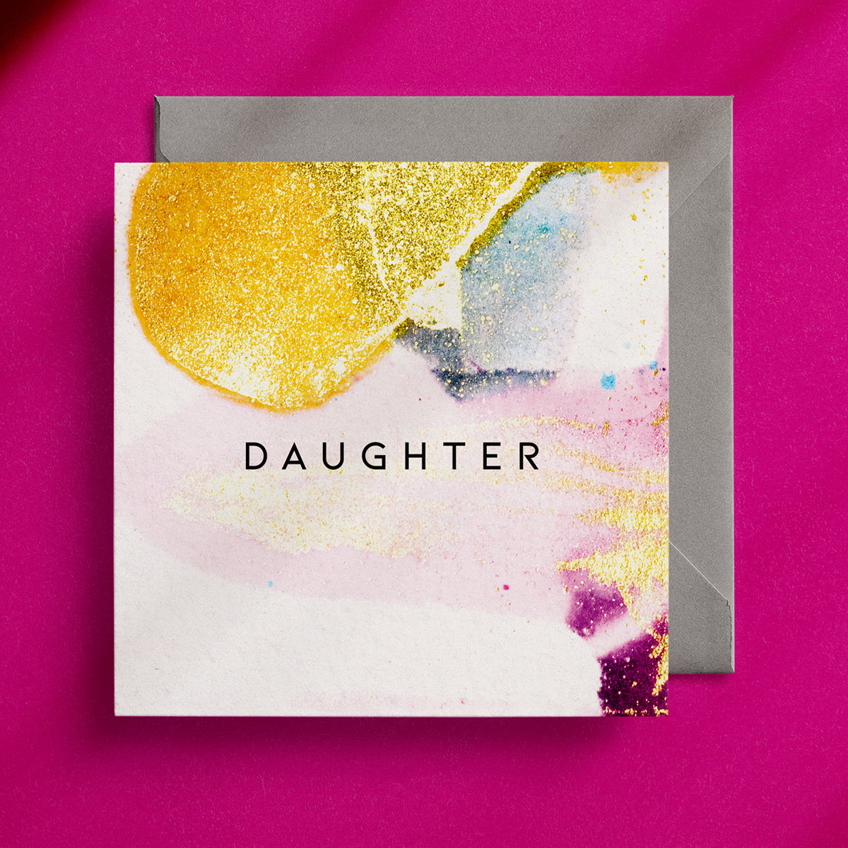 Pretty, feminine design on a square greeting card with the caption "Daughter" in the centre